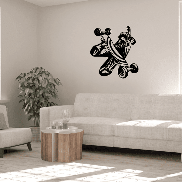 Skateboarding vinyl wall decal of a black cartoon rider on a skateboard