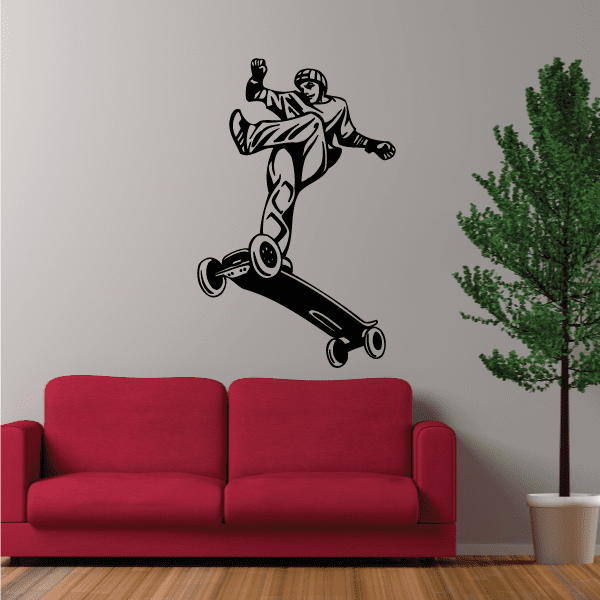 Skateboarding wall decal of a black skateboarder mid-air with skateboard