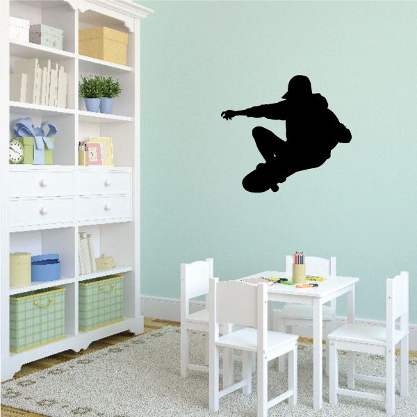 Vinyl skateboard wall decal with black skateboarder silhouette, stencil style