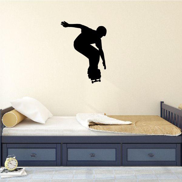 Skateboard wall decal with black skateboarder silhouette