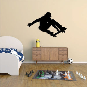 Skateboarding wall decal with black skateboarder silhouette