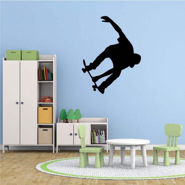 Skateboard wall decal with black skateboarder silhouette in midair