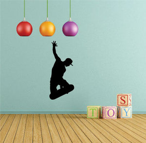 Skateboarding wall decal with a black skateboarder silhouette in mid-air