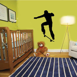 Skateboarding wall decal with black skateboarder silhouette