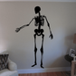 Black skeleton gesturing decal with raised arm and heart-shaped hand detail