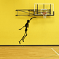 Black skeleton jumping wall decal with outstretched arms and legs