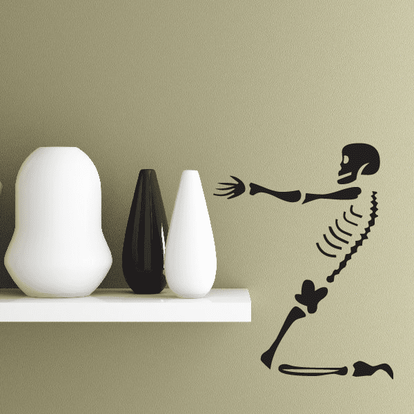 Black skeleton on knees wall decal with hands and knees pose