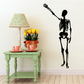 Black skeleton reaching wall decal with long arm and raised hand silhouette