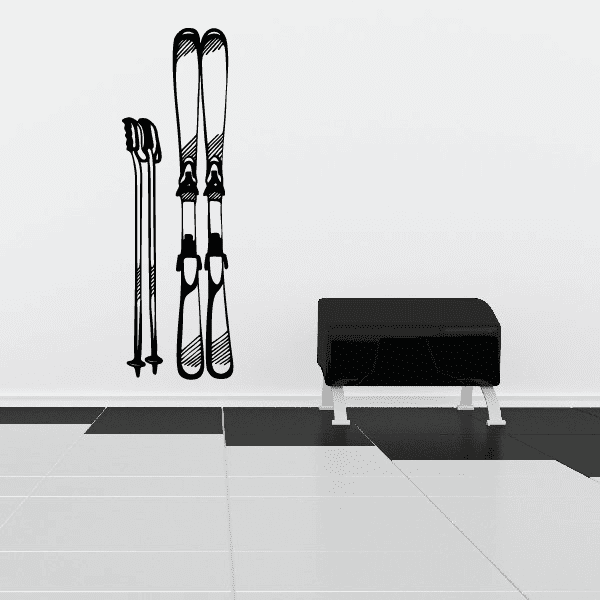 Ski poles and skis decal with black skis and pole line art on a light surface
