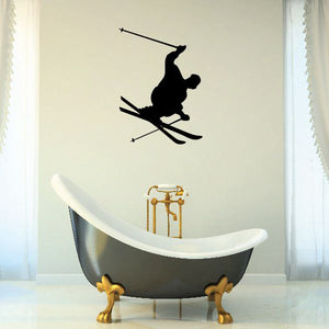 Skiing wall vinyl decal featuring a black skier silhouette