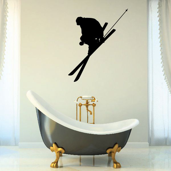Skiing wall decal: black skier silhouette with skis and poles on light wall
