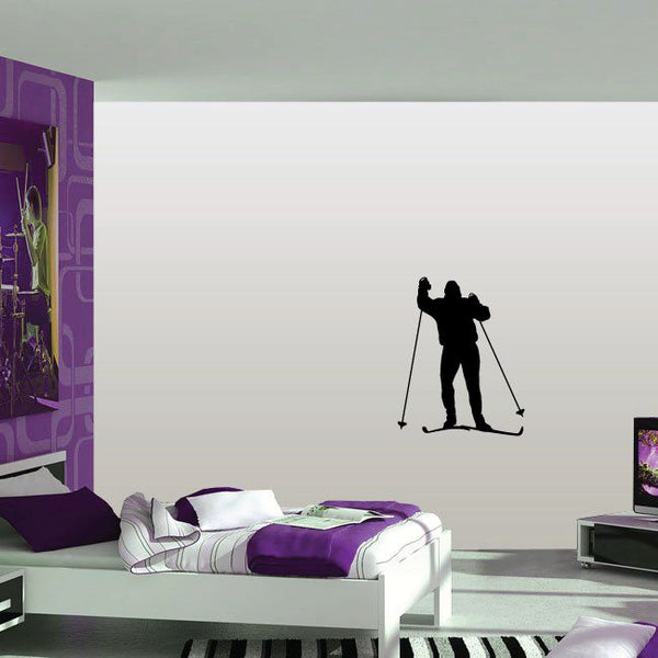Skiing wall decal vinyl sticker of a skier silhouette with ski poles
