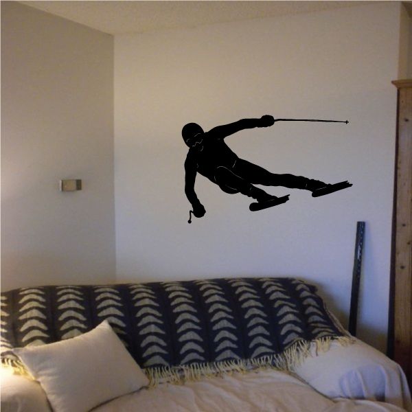 Skiing wall decal vinyl sticker with black skier silhouette in action pose
