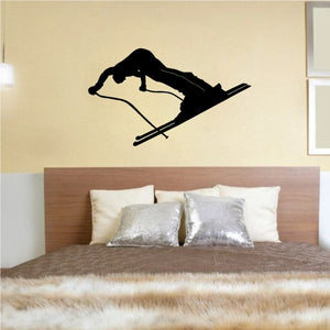 Skiing vinyl wall decal of a black skier silhouette in side profile