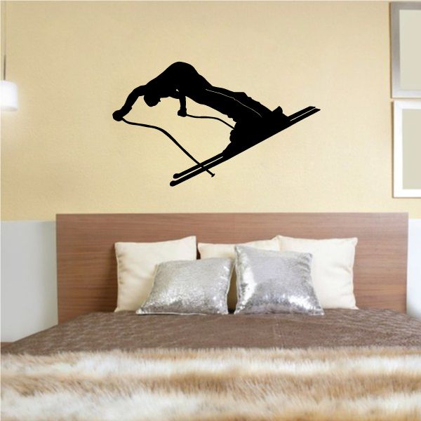 Skiing vinyl wall decal of a black skier silhouette in side profile