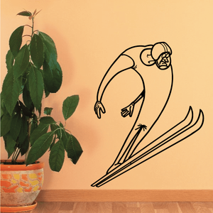 Skiing wall decal showing a skier leaning forward in motion