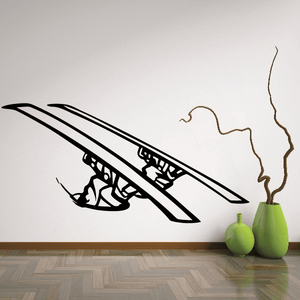 Black skiing wall vinyl decal with skier and skis graphic