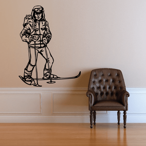 Skiing wall decal of a seated skier in black line art
