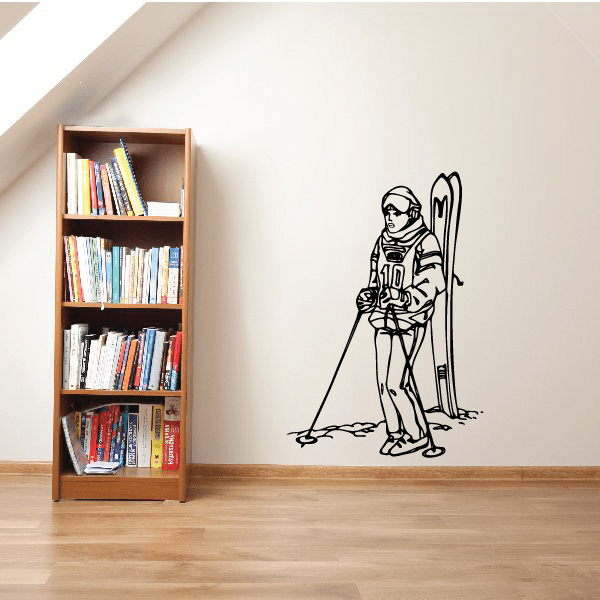 Skiing wall decal showing a black outline skier with skis and poles