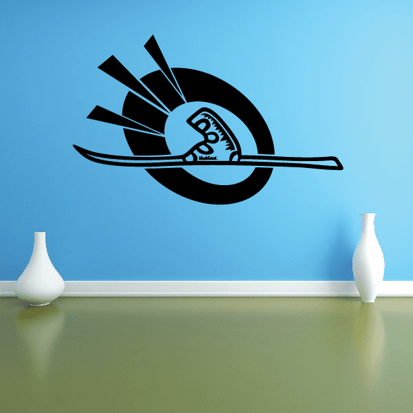 Skiing wall decal vinyl sticker with skier graphic and skis on a circular badge