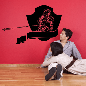 Skiing wall decal vinyl sticker of a black skier figure with pink details