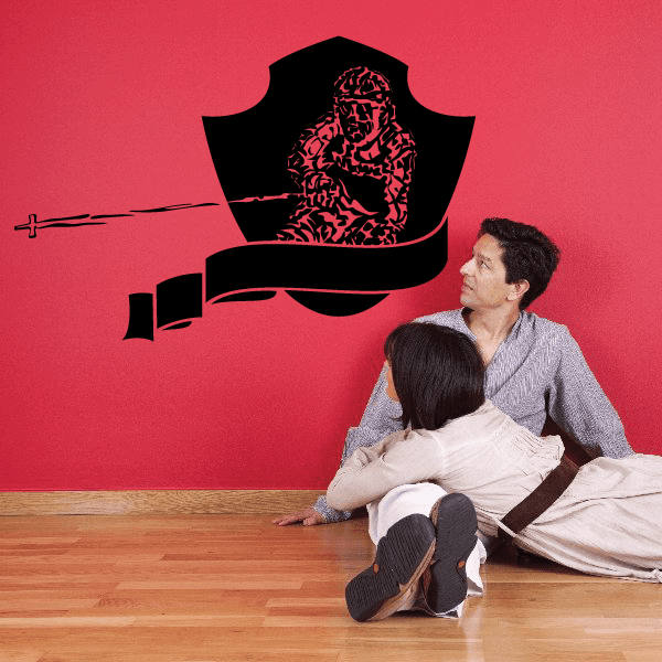 Skiing wall decal vinyl sticker of a black skier figure with pink details