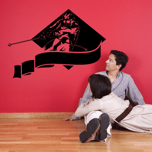 Skiing wall vinyl decal with skier silhouette holding ski poles, black graphic