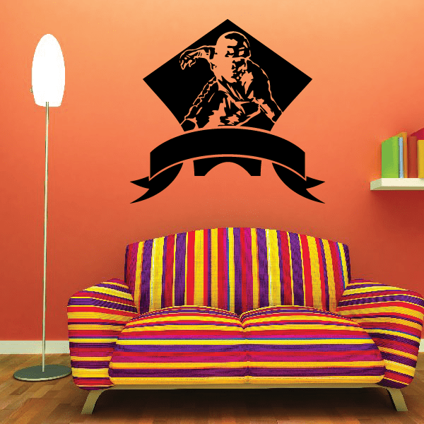 Skiing wall decal vinyl featuring black skier silhouette with crossed skis and ribbon banner