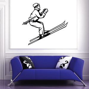 Skiing wall decal of a black-and-white skier riding skis