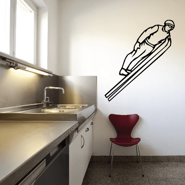 Skiing wall decal showing a black outline skier on skis