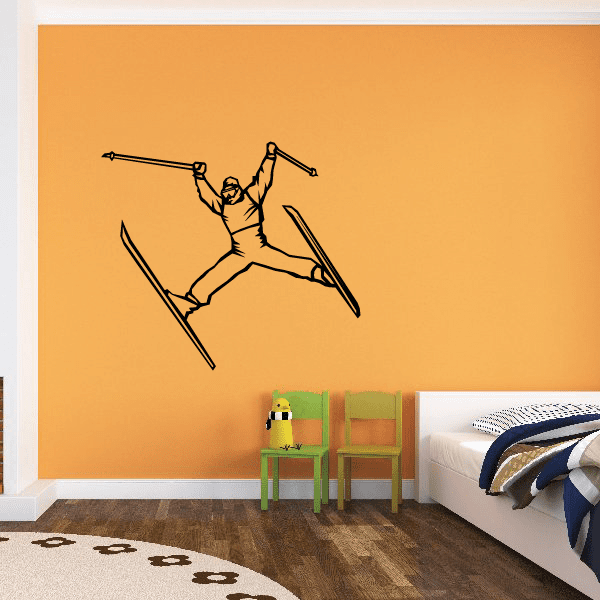 Skiing wall decal featuring a black skier silhouette with two skis