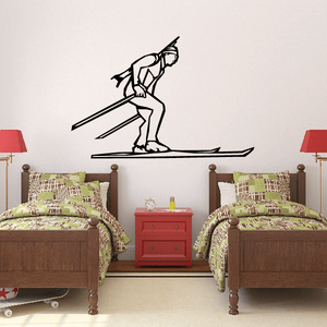 Skiing wall decal vinyl sticker of a black skier holding poles on skis