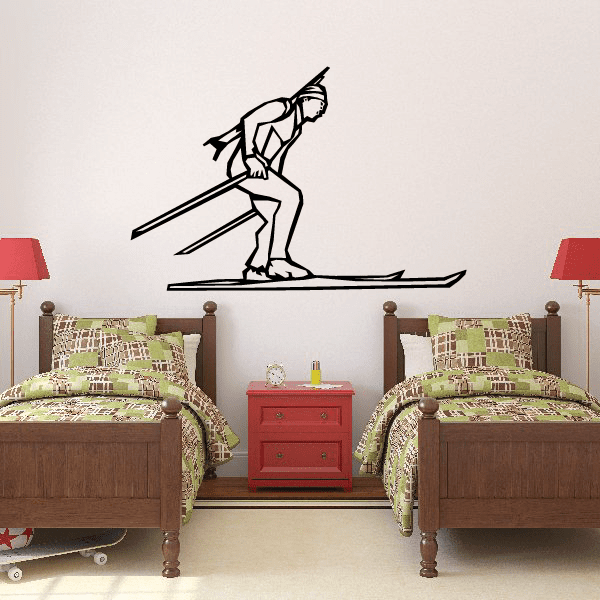 Skiing wall decal vinyl sticker of a black skier holding poles on skis