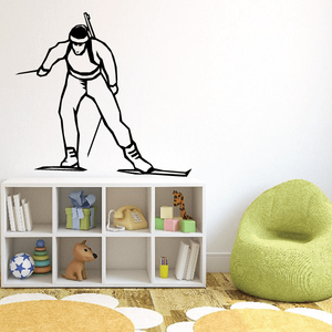 Skiing wall decal of a black-outlined skier in action pose