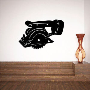 Black power saw wall decal with circular blade and angled handle