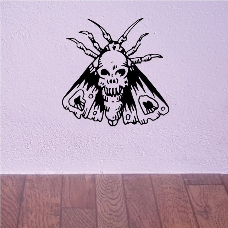 Skull-face moth decal with black and white winged skull design