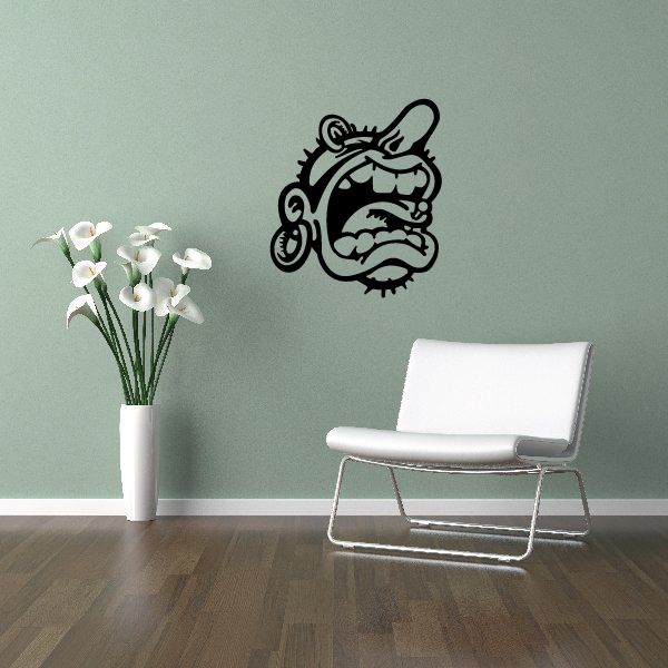 Black skull wall decal with cartoon outline, centered on wall