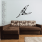 Black skull wall decal with stylized winged design