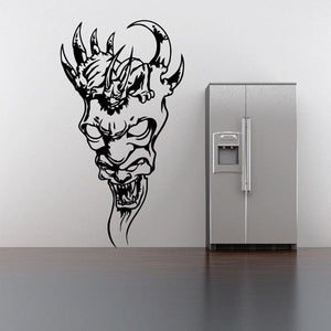 Black skull wall decal with horned, snarling face and decorative flames