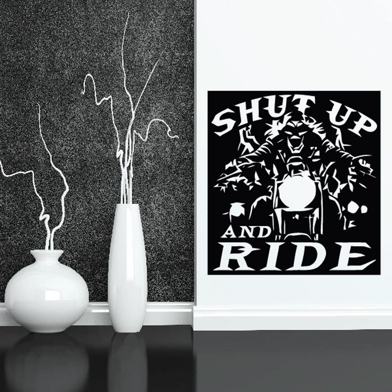 Skull vinyl decal with black-and-white graphic and bold RIDE text