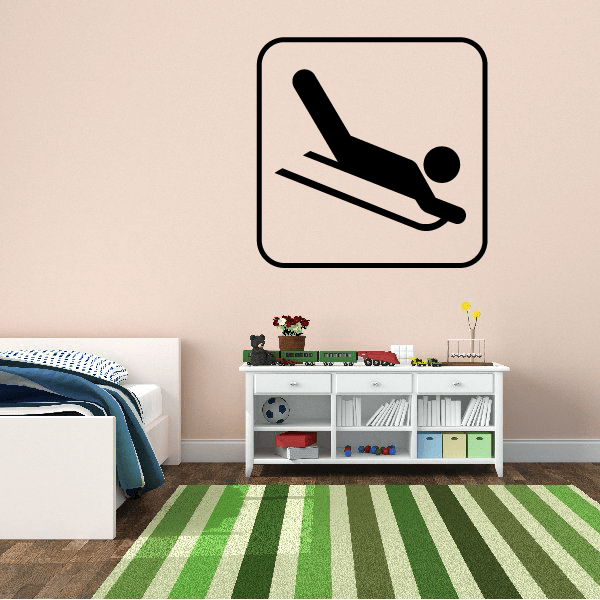 Sledding sign decal featuring a black sled icon inside a rounded square border