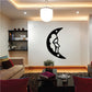 Crescent moon wall decal with sleeping woman silhouette in black and white