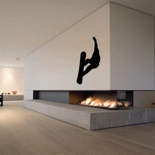 Snowboard wall decal of black snowboarder silhouette jumping