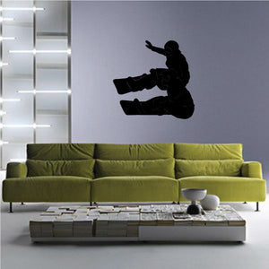Snowboard wall decal with black snowboarder silhouette riding snowboard
