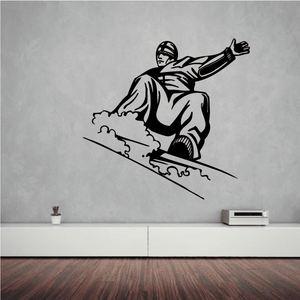 Snowboarder riding mountain decal, black and white outline with helmet and snowboard