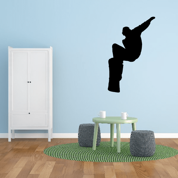 Snowboarding wall decal of black snowboarder jumping silhouette