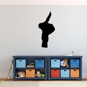 Black snowboarder silhouette wall decal, rider standing on snowboard