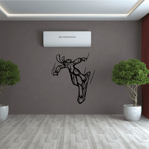 Snowboarding wall decal, black outline of a snowboarder jumping midair.
