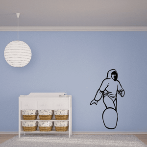 Snowboarding wall decal of a snowboarder figure with black outline and white suit