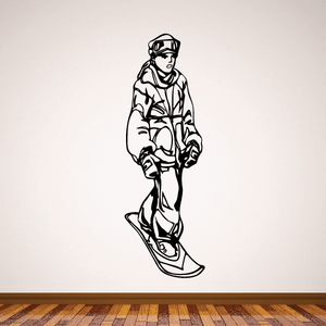 Snowboarding wall decal of black snowboarder holding a snowboard